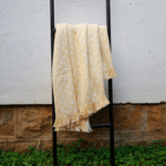 white yellow cotton throws